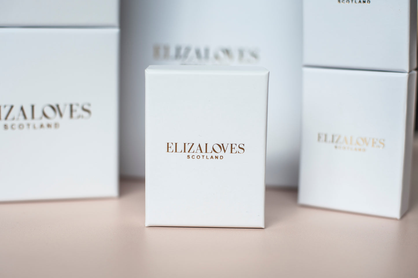 Celine Pearl Huggie Earrings